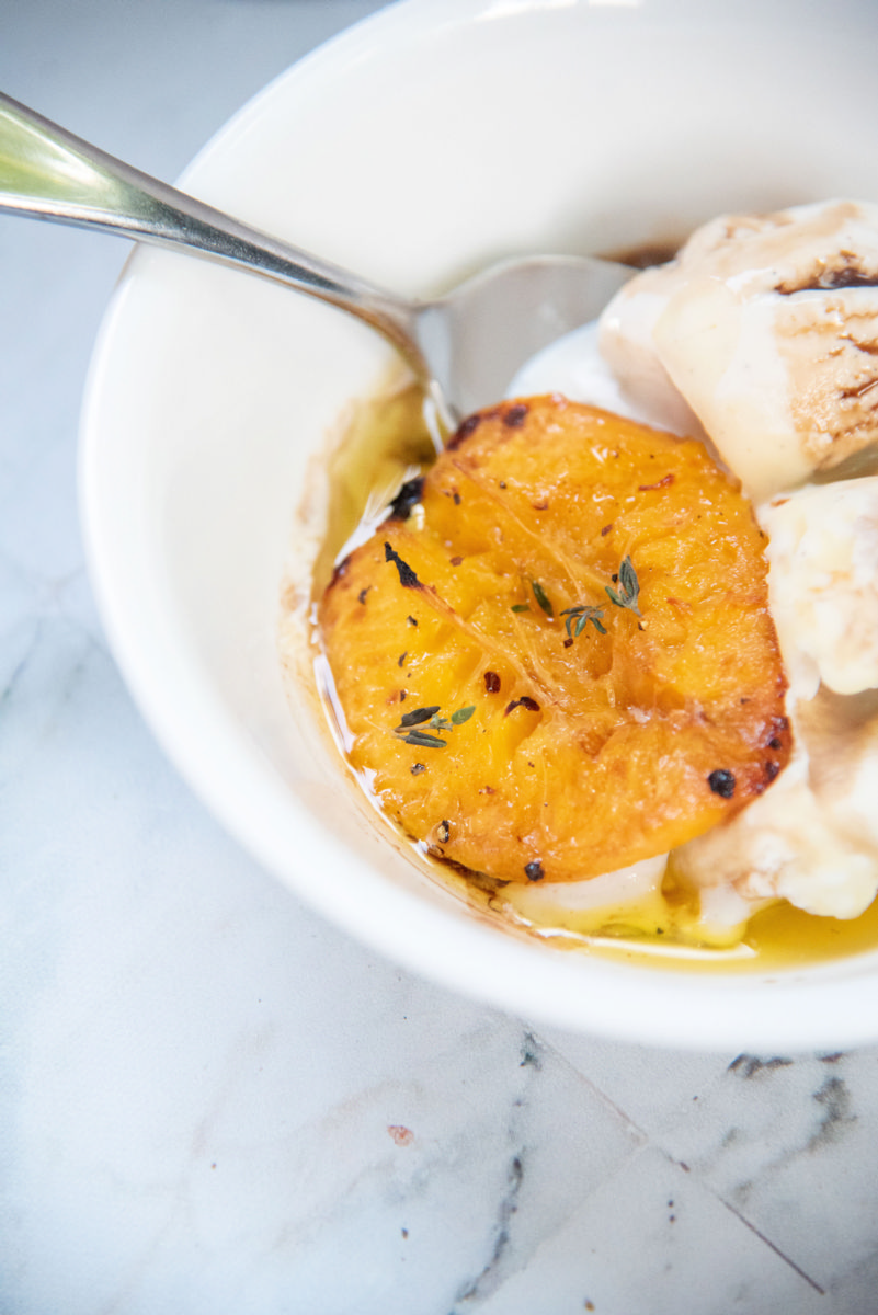 broiled peaches with vanilla ice cream 