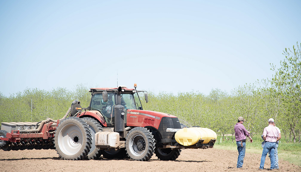 men with a tractor