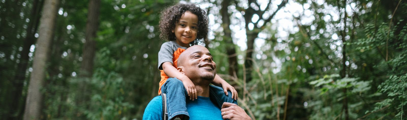 Dad hiking with son