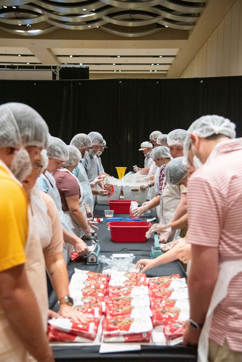 Volunteers in hairnets